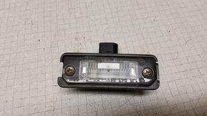 Volkswagen Polo Lampa oświetlenia tylnej tablicy rejestracyjnej 1J6943021B