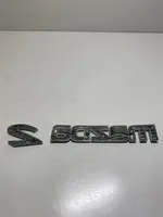 Mazda 2 Mostrina con logo/emblema della casa automobilistica D65251710