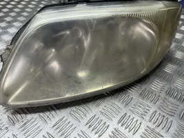 Chrysler Voyager Lampa przednia 04857703AB