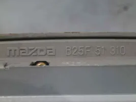 Mazda 323 F Kattokonsolin valaisinyksikön koristelista B25F51310