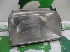 Renault Express Lampa przednia 7700811984