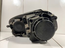 Volkswagen Golf V Lampa przednia 1K6941006Q