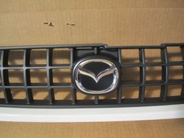 Mazda Demio Augšējais režģis 