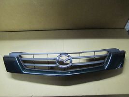 Mazda Demio Grille calandre supérieure de pare-chocs avant D26750712