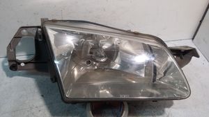 Mazda 323 F Lampa przednia 1305235393