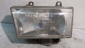 Mazda B2500 Lampa przednia 10016020