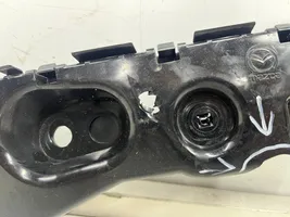 Mazda 3 Uchwyt / Mocowanie zderzaka tylnego bcka502j1