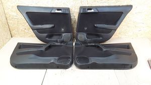 Opel Astra G Set di rivestimento del pannello della portiera 009100467