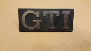 Volkswagen Golf I Logo/stemma case automobilistiche 191853679