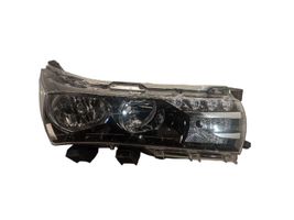 Toyota Corolla E160 E170 Lampa przednia 8111002E71