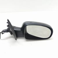 Opel Corsa C Manualne lusterko boczne drzwi przednich E1010676