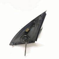 Opel Corsa C Manualne lusterko boczne drzwi przednich E1010676