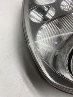 Volkswagen Touran I Lampa przednia 0301205201