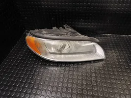 Volvo V70 Lampa przednia 31214348