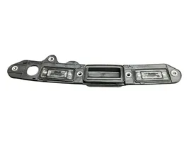 Volkswagen Touran I Trunk door license plate light bar 1T0827574A