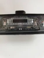 Volkswagen Golf V Lampa oświetlenia tylnej tablicy rejestracyjnej 1J6943021B