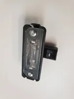 Volkswagen Golf V Lampa oświetlenia tylnej tablicy rejestracyjnej 1J6943021B