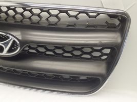 Hyundai Santa Fe Maskownica / Grill / Atrapa górna chłodnicy E865612B000