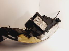 Saab 9-5 Lampa przednia 89008300