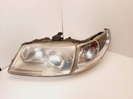 Saab 9-5 Lampa przednia 89008300