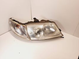 Saab 9-5 Lampa przednia 89008301