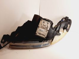 Saab 9-5 Lampa przednia 89008301