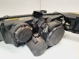 Saab 9-5 Lampa przednia 89008301