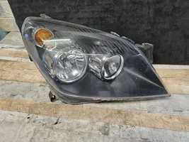 Opel Astra H Lampa przednia 1EG27037002