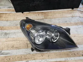 Opel Astra H Lampa przednia 1EG27037002