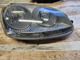 Volkswagen Golf V Lampa przednia A048760