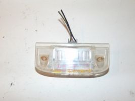 Chrysler Voyager Lampa oświetlenia tylnej tablicy rejestracyjnej 4576235