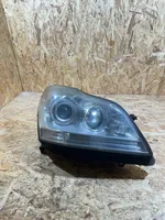 Mercedes-Benz GL X164 Uchwyt / Mocowanie lampy przedniej A1648280491