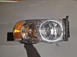 Dodge RAM Lampa przednia 55077120A