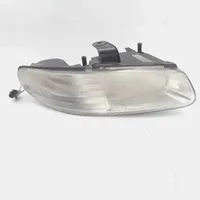 Chrysler Voyager Lampa przednia 04576312AB