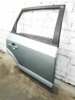 Hyundai Tucson JM Rear door 