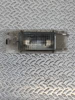 Renault Megane II Lampa oświetlenia tylnej tablicy rejestracyjnej 7700796163