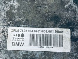 BMW 1 E81 E87 Ohjaustehostimen pumpun kannake 7794455