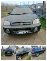 Hyundai Santa Fe Zacisk hamulcowy przedni 5818026A10