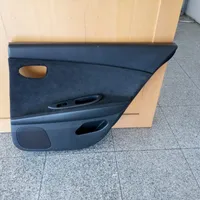 Nissan Primera Garniture panneau de porte arrière 