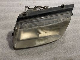 Volkswagen PASSAT B5 Lampa przednia 14869100