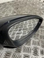 Volkswagen PASSAT B7 Front door electric wing mirror E1021005