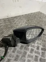 Volkswagen PASSAT B7 Front door electric wing mirror E1021005