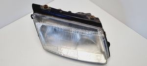 Volkswagen PASSAT B5 Lampa przednia 064411125R