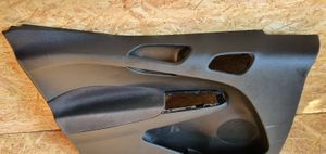 Ford Transit Courier Rivestimento del pannello della portiera anteriore ET76V23943A