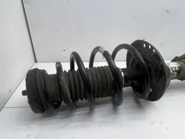 Opel Astra J Front shock absorber with coil spring 13354031