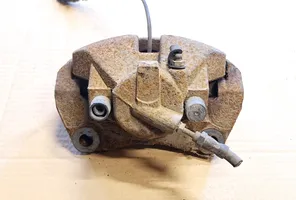 Volkswagen Touareg I Front brake caliper 0