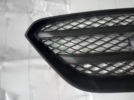 KIA Carens III Grille inférieure de pare-chocs avant 86390-10000