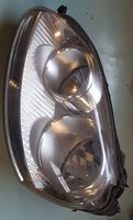 Volkswagen Golf V Lampa przednia 1K6941005R