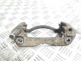 Mazda 323 Plaquette / support d'étrier avant 