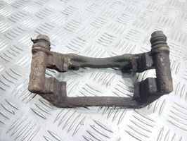 Volkswagen PASSAT B4 Plaquette / support d'étrier avant 